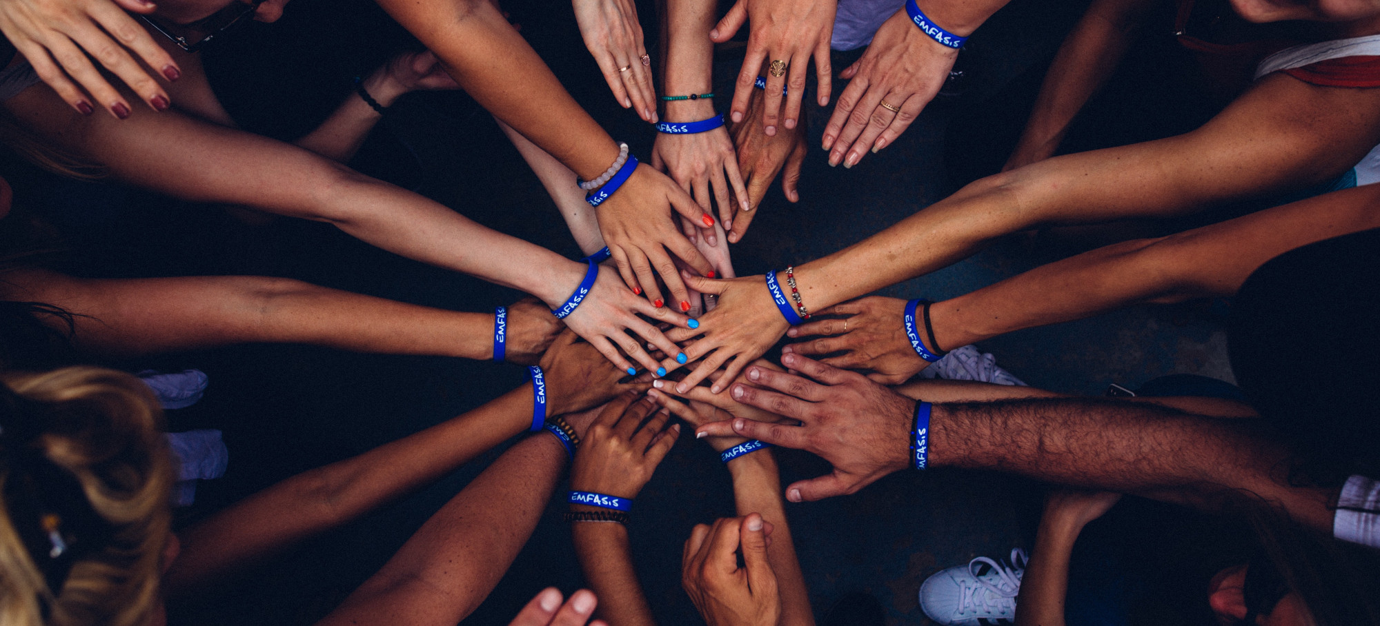 Fundraising campaign pic showing volunteer arms